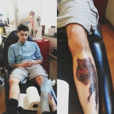 Wolf And Feather Tattooed on Leg