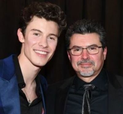 Manuel Mendes with son